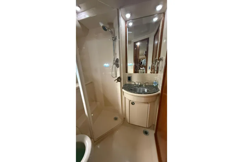 Slide: The Image of Luxurious bathroom in 2004 Meridian 459 Motoryacht with shower and sink. - 15