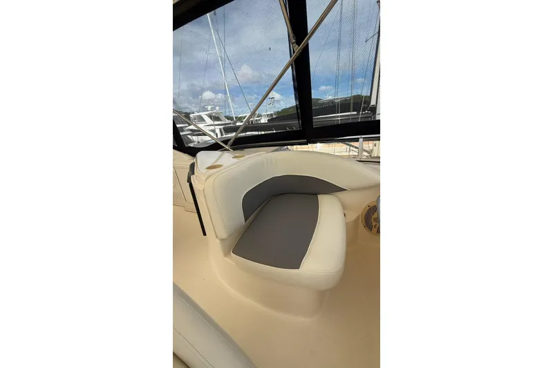 Slide: The Image of 2004 Meridian 459 Motoryacht interior seating with window view. - 22