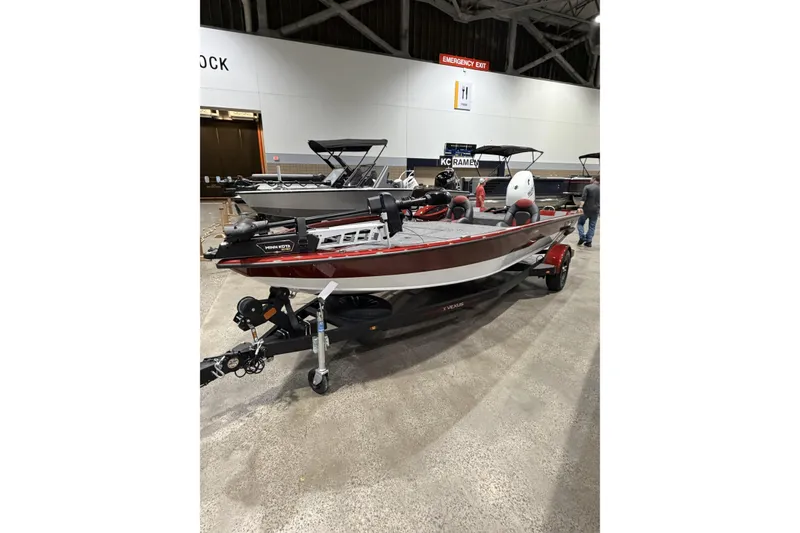 The Image of 2026 Vexus AVX 1880c boat on display in an indoor showroom. - 0