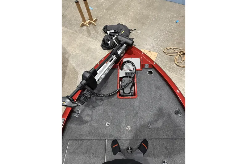Slide: The Image of 2026 Vexus AVX 1880c boat deck with trolling motor and carpeted surface. - 10