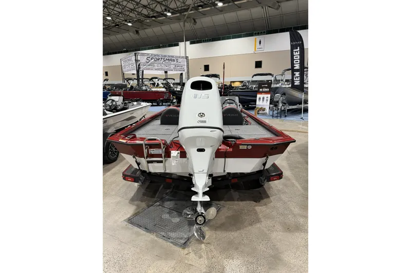 Slide: The Image of 2026 Vexus AVX 1880c boat displayed at an indoor exhibition, rear view. - 4