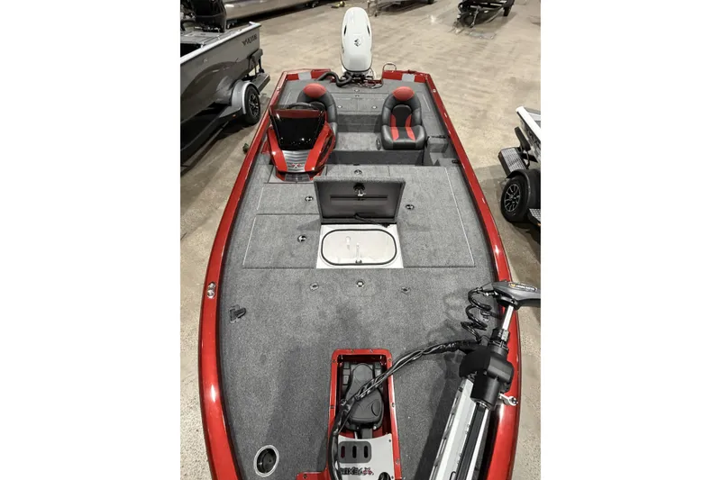 Slide: The Image of 2026 Vexus AVX 1880c fishing boat interior with red accents and advanced equipment. - 6