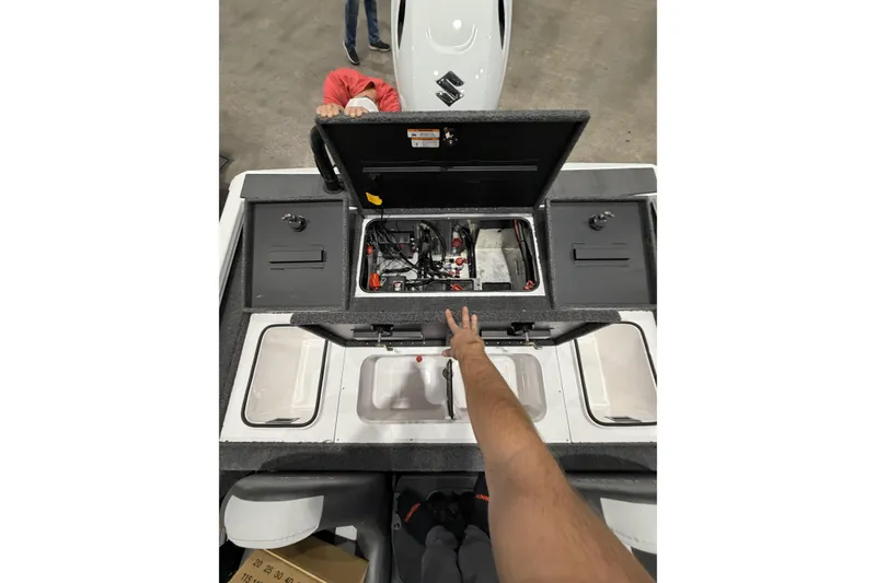 Slide: The Image of Interior view of 2026 Vexus Defender 189 boat showing storage compartments and equipment. - 8