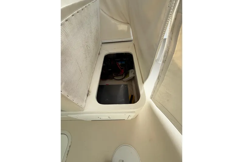 Slide: The Image of 2007 Steiger Craft 26 Miami boat interior storage compartment. - 15