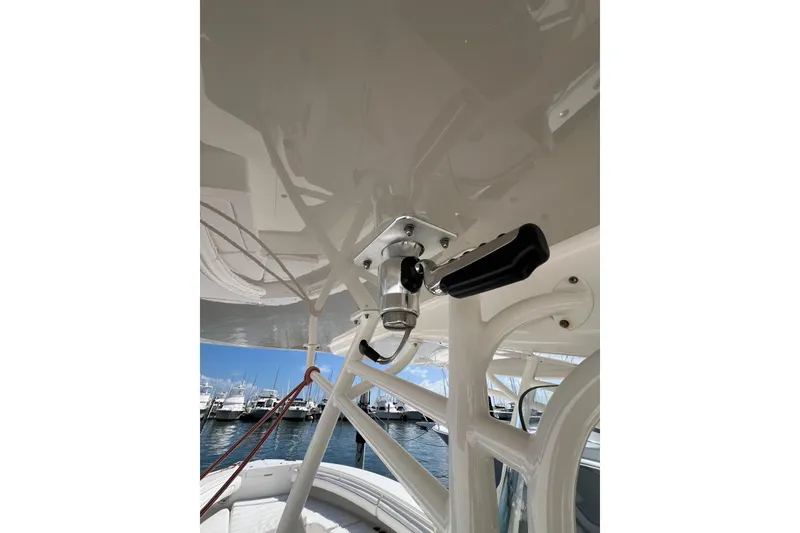 Slide: The Image of 2016 Regulator 34 Center Console boat detail with marina background. - 7