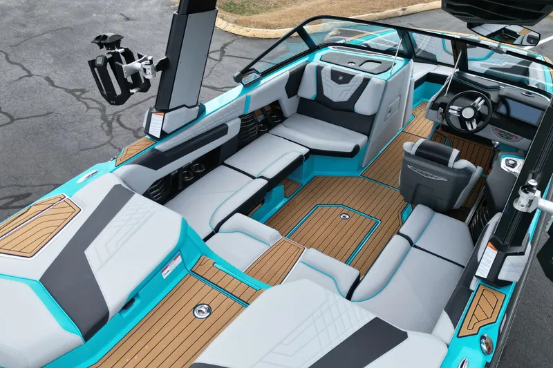 Slide: The Image of 2022 Nautique Super Air Nautique G21 interior with sleek seating and modern design. - 16