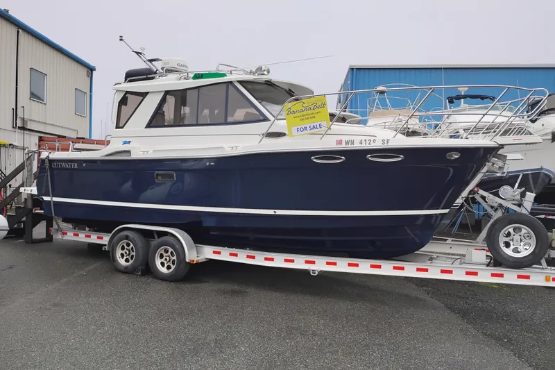 The Image of 2015 Cutwater C-26 boat on trailer, for sale at marina. - 0