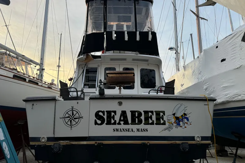 Slide: The Image of 1990 Luhrs 320 Tournament boat named "SEABEE" in Swansea, Massachusetts marina. - 4
