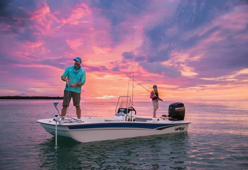 Slide: The Image of Anglers on Mako Pro Skiff 17 CC at sunset. - 13
