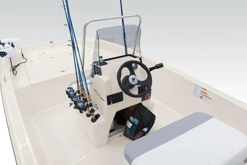 Slide: The Image of Interior view of 2022 Mako Pro Skiff 17 CC with steering console. - 23