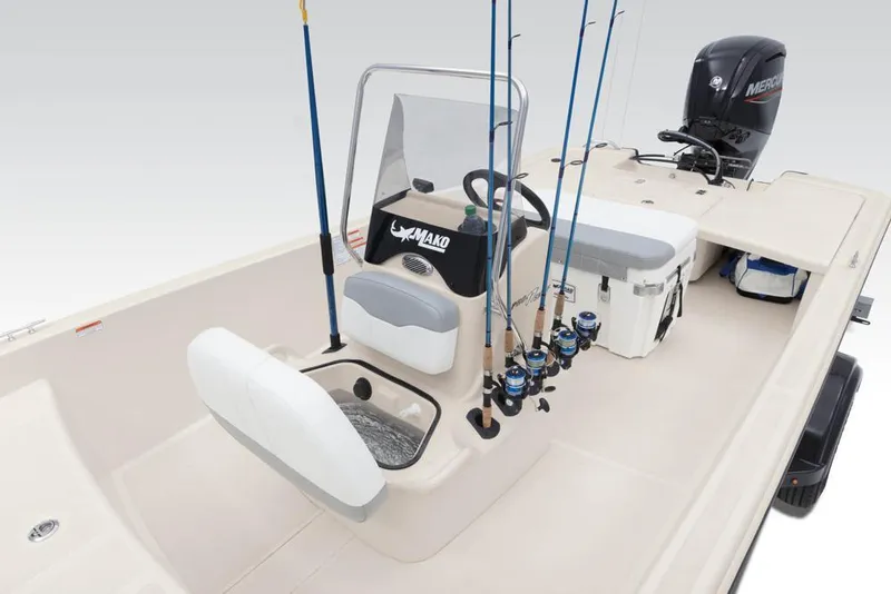 Slide: The Image of 2022 Mako Pro Skiff 17 CC with fishing rods and motor. - 25