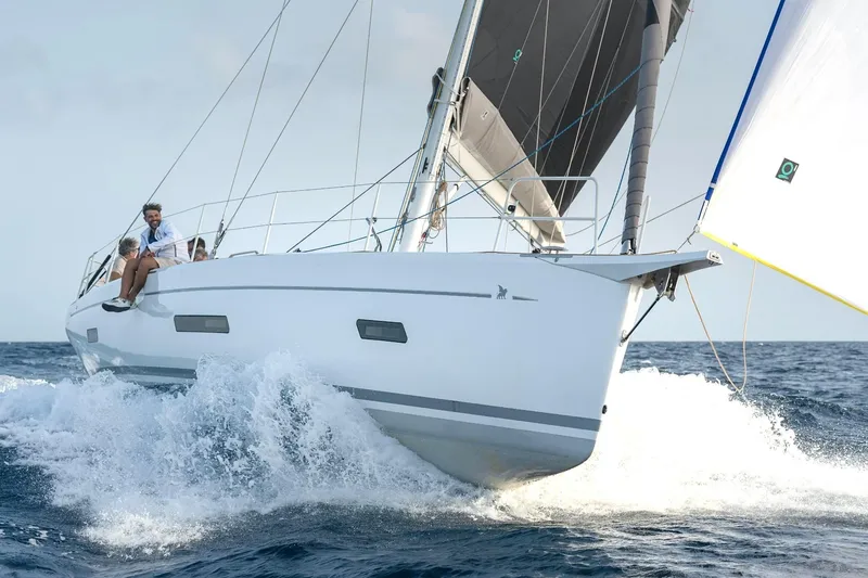 Slide: The Image of 2026 Italia Yachts 12.98 sailing on open sea with crew onboard. - 5