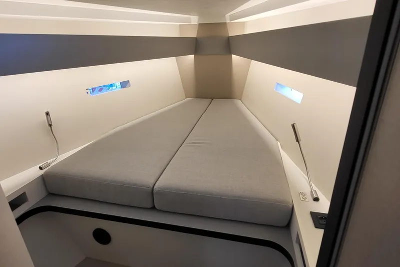 Slide: The Image of Modern interior cabin of 2026 Italia Yachts 12.98, featuring sleek design and comfortable bedding. - 7