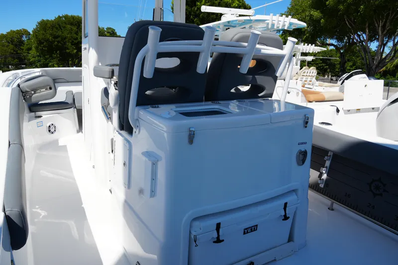 Slide: The Image of 2025 NauticStar 292 Legacy boat interior with seating and storage features. - 6