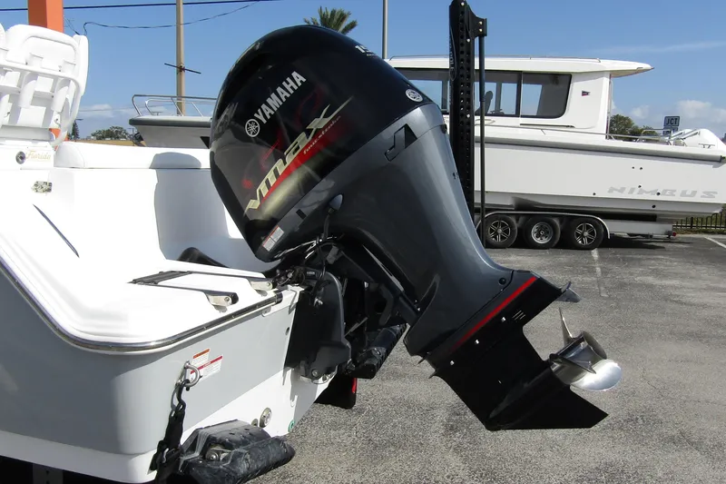 Slide: The Image of 2023 Sportsman Open 212 Center Console with Yamaha outboard motor. - 2