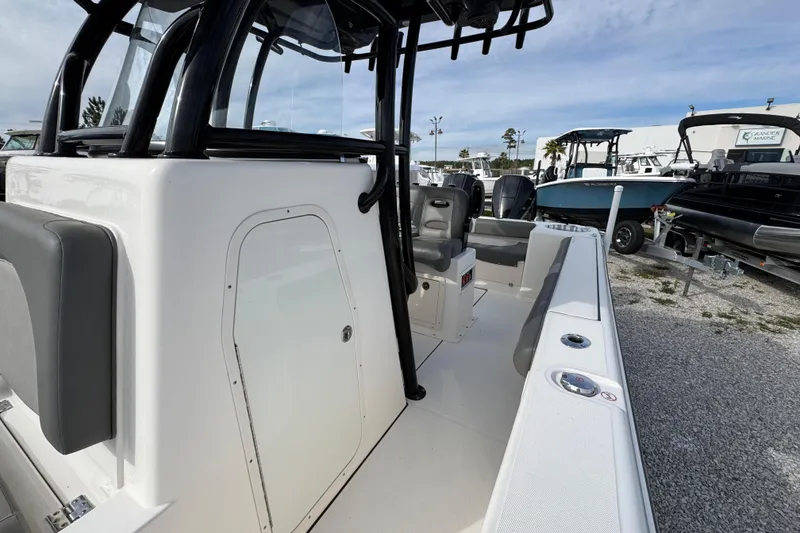 Slide: The Image of 2021 Sea Born LX26 Center Console boat, featuring sleek design and spacious seating. - 23
