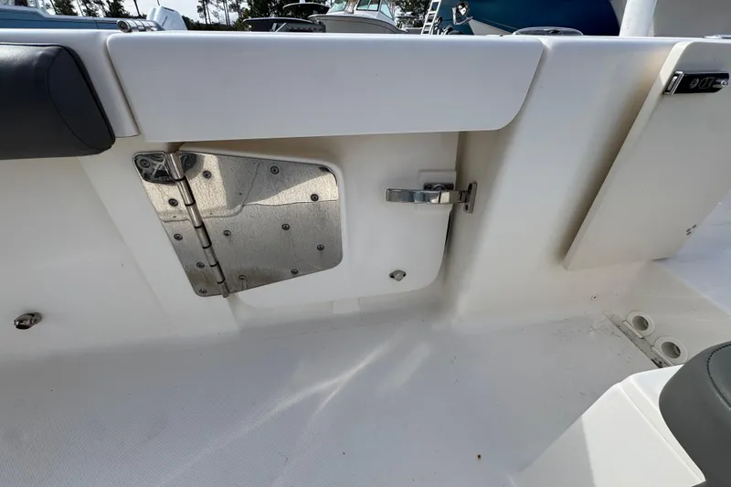 Slide: The Image of 2021 Sea Born LX26 Center Console boat interior with stainless steel hardware. - 42