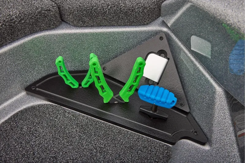 Slide: The Image of Manufacturer Provided Image: 2026 Ranger Z520 boat interior with green and blue accessory holders. - 41