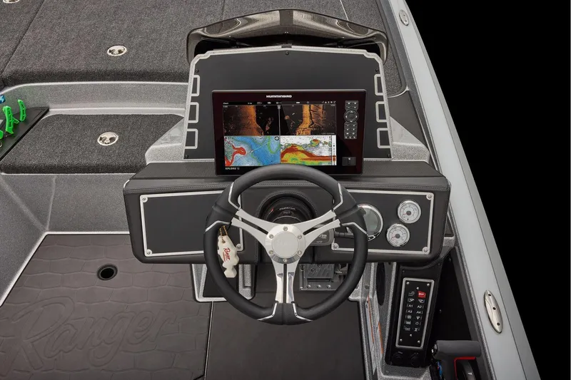 Slide: The Image of Manufacturer Provided Image: 2026 Ranger Z520 boat dashboard with steering wheel and advanced navigation display. - 48