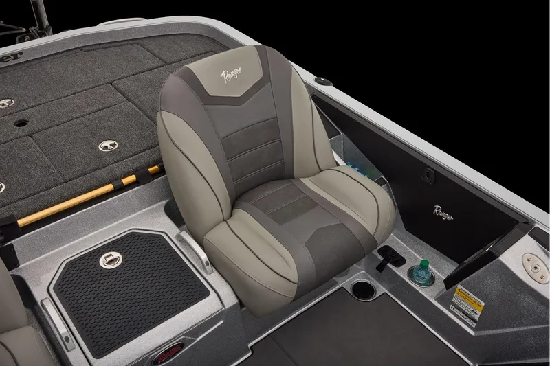 Slide: The Image of Manufacturer Provided Image: 2026 Ranger Z520 boat interior with cushioned seat and storage compartments. - 57