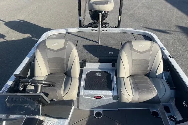 Slide: The Image of 2026 Ranger Z520 boat interior with dual gray seats and steering console. - 6