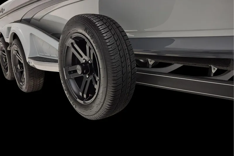 Slide: The Image of Manufacturer Provided Image: 2026 Ranger Z520 boat trailer with black Kenda tires, close-up view. - 78