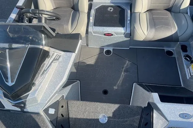 Slide: The Image of 2026 Ranger Z520 boat interior with seating and steering wheel, showcasing modern design and functionality. - 84