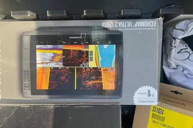 Slide: The Image of Box of Garmin ECHOMAP Ultra 126SV on Ranger Z520, 2026 model. - 86