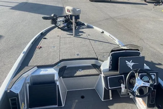 Slide: The Image of 2026 Ranger Z520 boat interior with steering wheel and seating, featuring a trolling motor. - 9