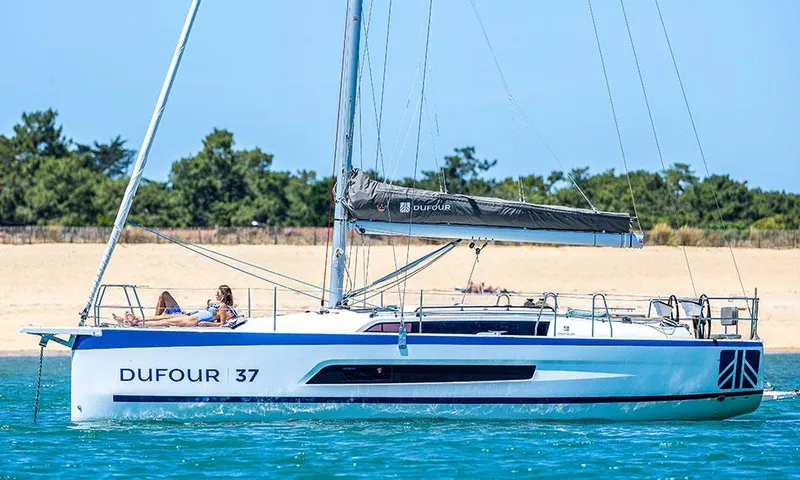 Slide: The Image of Manufacturer Provided Image: Dufour 37 sailboat, 2026, on calm water near sandy beach. - 17