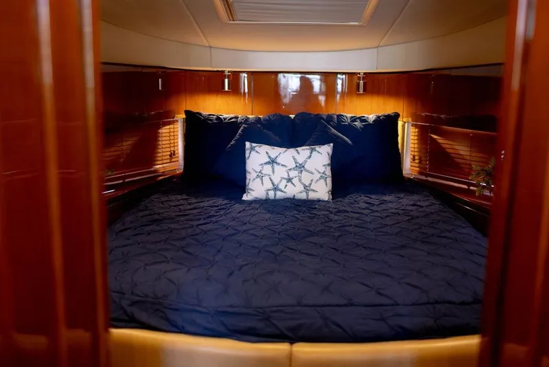 Slide: The Image of Luxurious cabin interior of 2009 Searay 43 Sundancer yacht with plush bedding. - 21