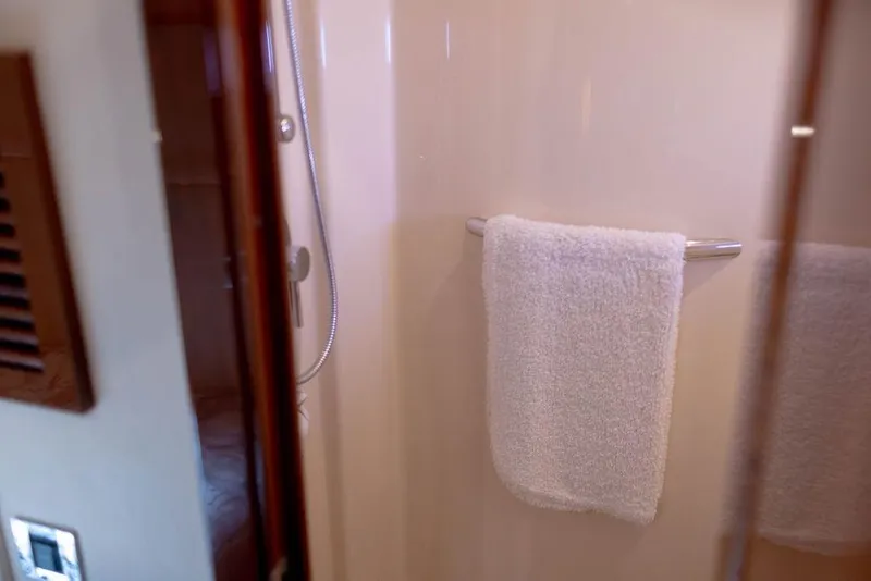 Slide: The Image of Bathroom interior of 2009 Searay 43 Sundancer yacht with towel on rail. - 30