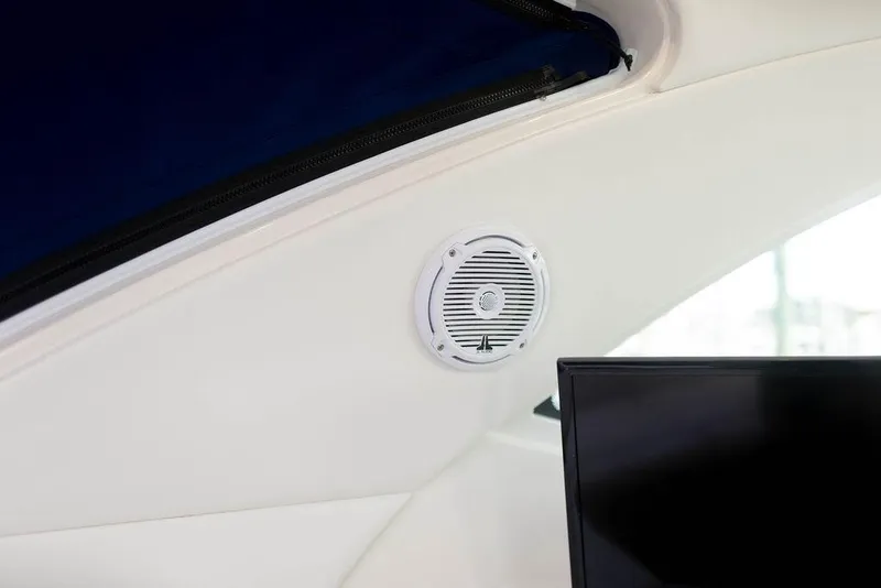 Slide: The Image of Speaker and TV inside 2009 Searay 43 Sundancer yacht cabin. - 34