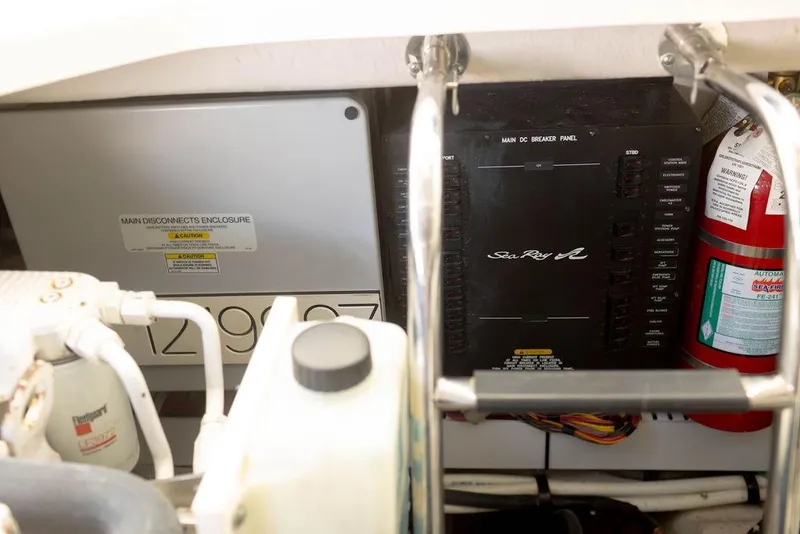 Slide: The Image of Electrical panel and fire extinguisher in 2009 Searay 43 Sundancer boat. - 38