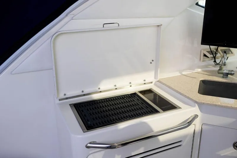 Slide: The Image of Outdoor grill and sink on 2009 Searay 43 Sundancer yacht. - 9