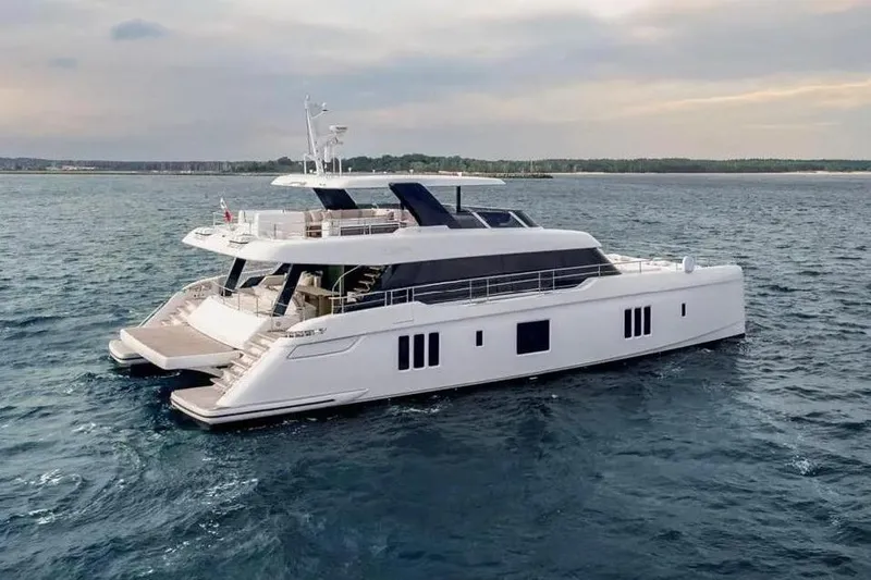 The Image of 2024 Sunreef 80 POWER CAT yacht cruising on open water. - 1