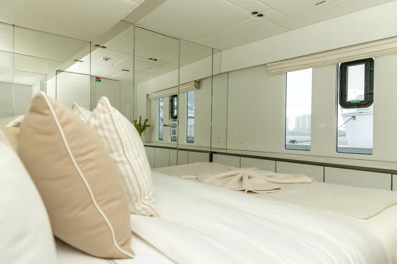 Slide: The Image of Luxurious bedroom interior of 2024 Sunreef 80 Power Cat yacht with elegant decor. - 15