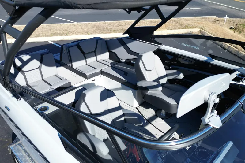 Slide: The Image of 2024 Yamaha Boats 255XE interior with modern seating and sleek design. - 8