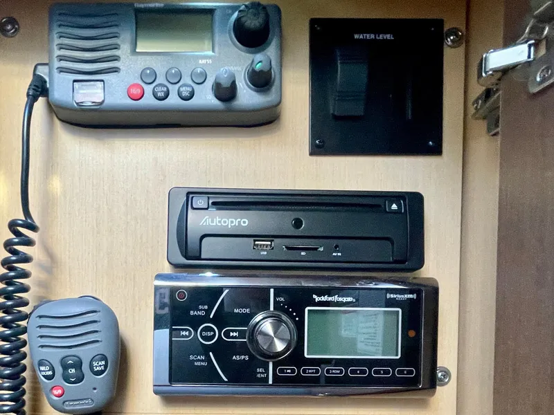 Slide: The Image of Control panel of a 2014 Sea Ray 330 Sundancer boat with radio and audio system. - 25