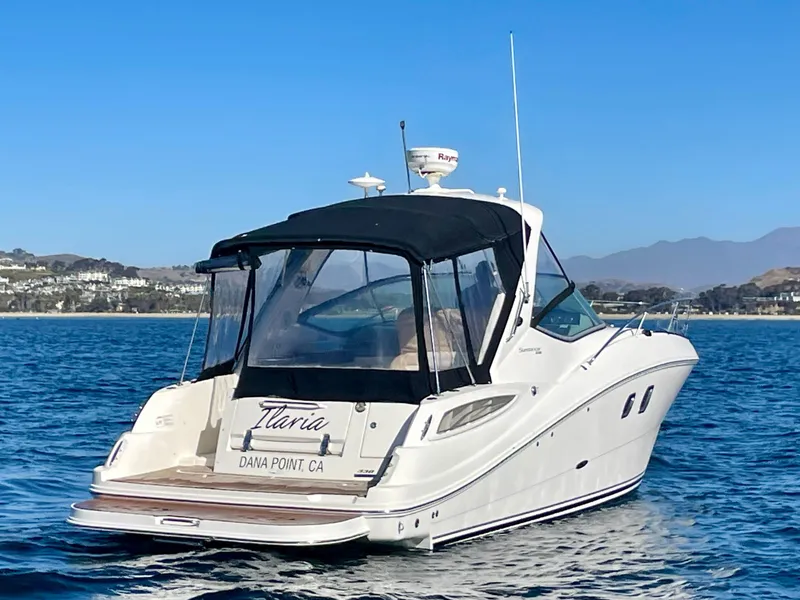 Slide: The Image of 2014 Sea Ray 330 Sundancer yacht on calm water near Dana Point, CA. - 4
