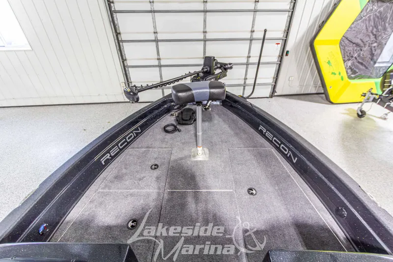 Slide: The Image of 2026 Recon 895 DC boat interior at Lakeside Marina, featuring sleek design and advanced equipment. - 29