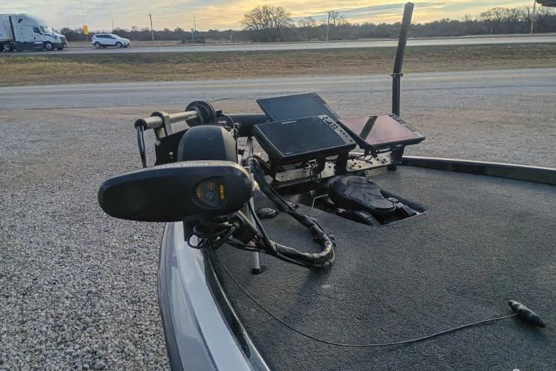 Slide: The Image of 2020 Skeeter FXR21 boat with advanced navigation equipment and dual screens on deck. - 2