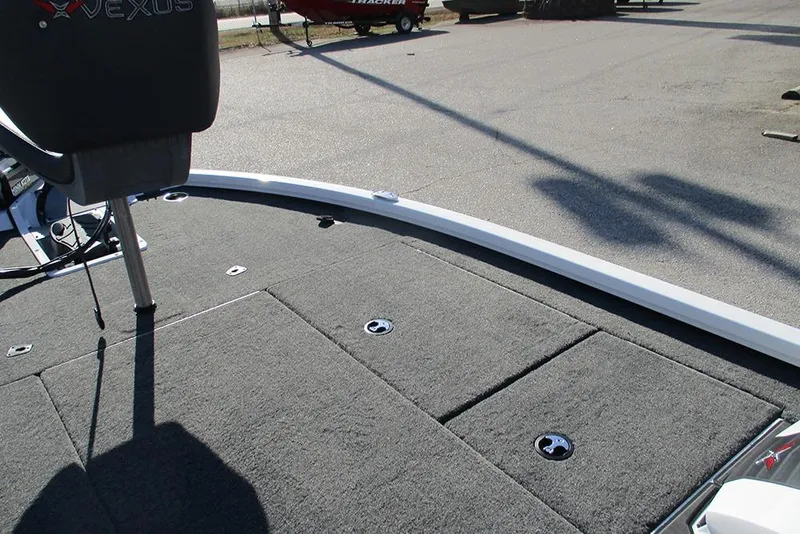 Slide: The Image of 2026 Vexus AVX 1980 boat deck with carpeted surface and seating. - 11