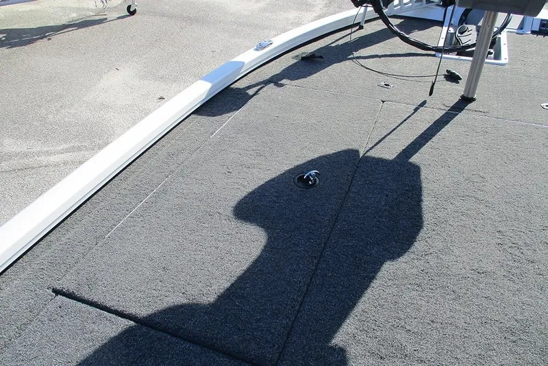 Slide: The Image of 2026 Vexus AVX 1980 boat deck with shadow and fishing equipment. - 15