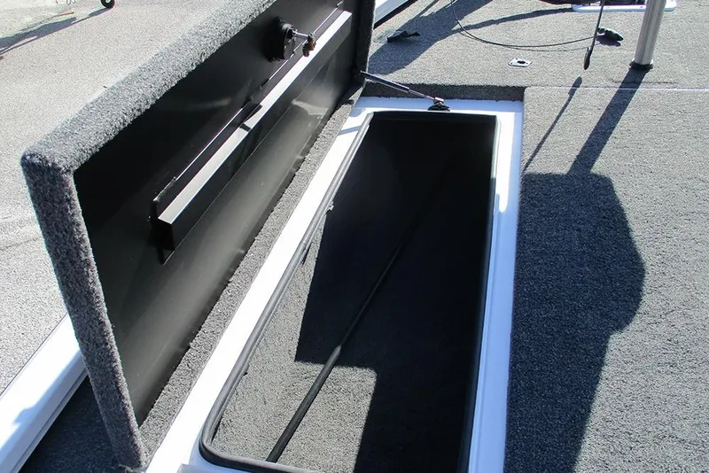 Slide: The Image of Open storage compartment on 2026 Vexus AVX 1980 boat deck. - 16