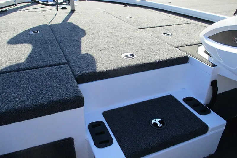 Slide: The Image of 2026 Vexus AVX 1980 boat deck with gray carpet and storage compartments. - 17