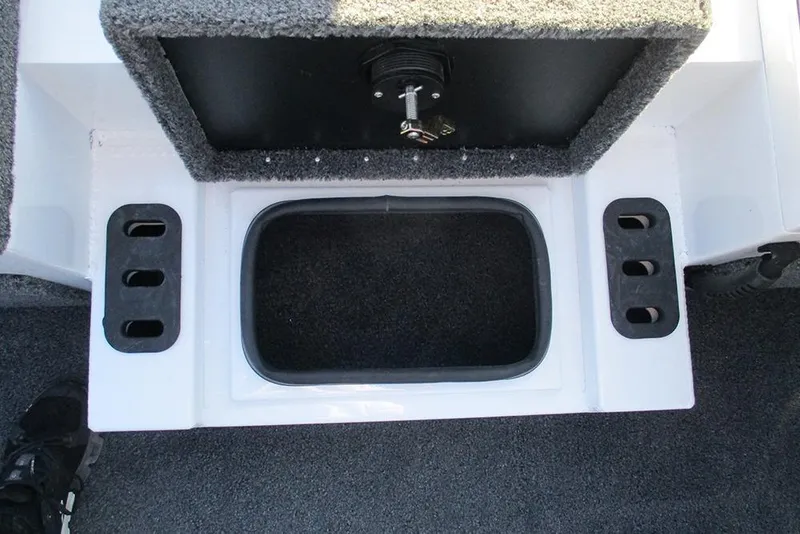 Slide: The Image of Vexus AVX 1980 boat interior detail, featuring a storage compartment, 2026 model. - 19