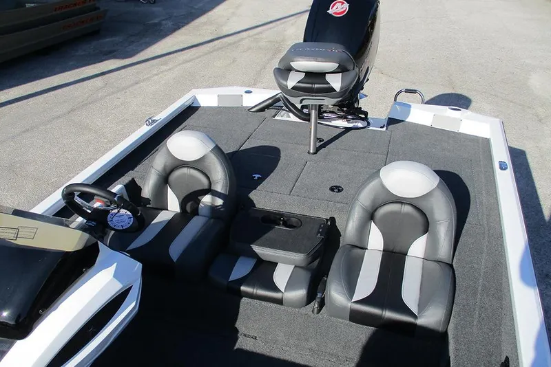 Slide: The Image of 2026 Vexus AVX 1980 boat interior with gray seating and steering wheel. - 20