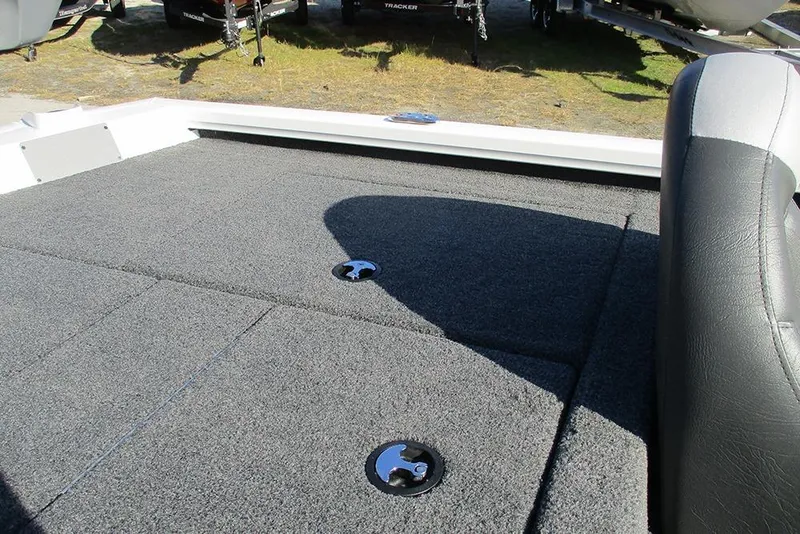 Slide: The Image of 2026 Vexus AVX 1980 boat interior with carpeted deck and storage compartments. - 25