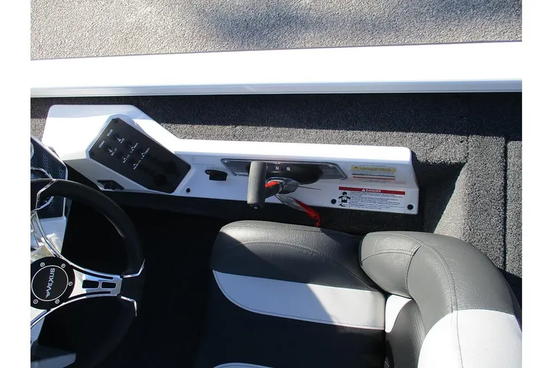 Slide: The Image of Interior of 2026 Vexus AVX 1980 boat showing steering wheel and control panel. - 31